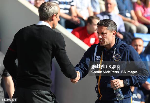 Shrewsbury Town manager Paul Hurst greets Charlton Athletic caretaker manager Lee Bowyer