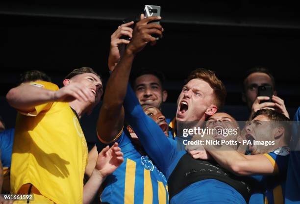 Shrewsbury Town's Carlton Morris Shrewsbury Town's Jon Nolan and Shrewsbury Town goalkeeper Dean Henderson celebrates with teammates after winning...