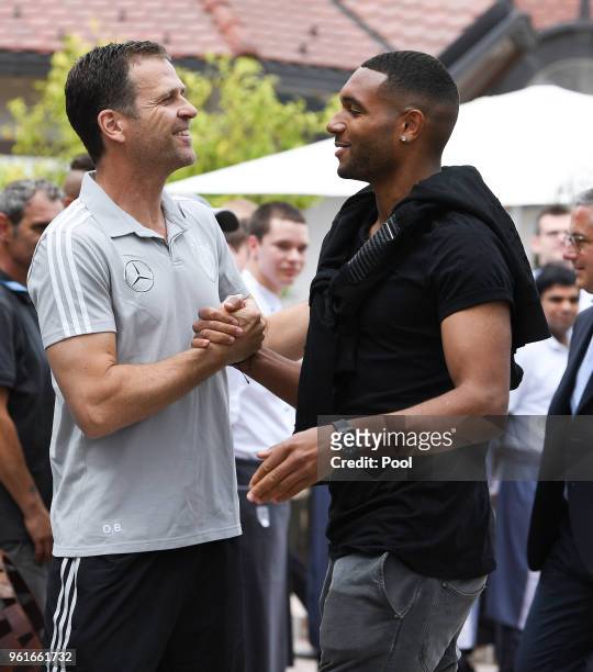 Team Manager, Olivier Bierhoff greets Jonathan Tah as he arrives on day one of the Germany National Football team's training camp at Hotel Weinegg on...