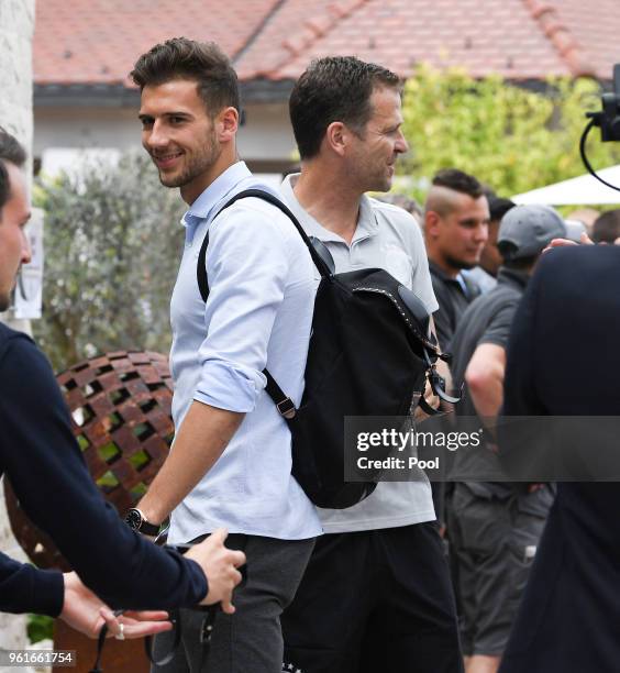 Leon Goretzka is greeted by team manager Oliver Bierhoff, as he arrives on day one of the Germany National Football team's training camp at Hotel...