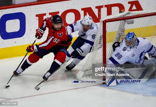 Anton Stralman and goalie Andrei Vasilevskiy of the Tampa Bay Lightning against Evgeny Kuznetsov of the Washington Capitals during Game Six of the...