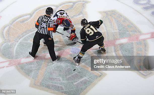 Greg McKegg of the Erie Otters takes a faceoff against Nazem Kadri of the London Knights in a game on January 22, 2010 at the John Labatt Centre in...