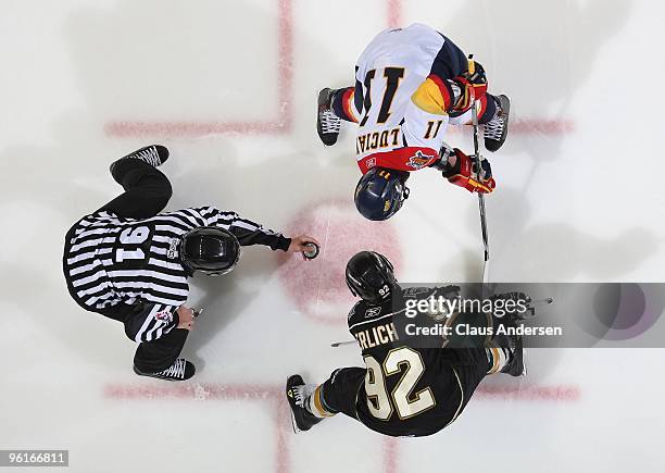 Anthony Luciani of the Erie Otters takes a faceoff against Daniel Erlich of the London Knights in a game on January 22, 2010 at the John Labatt...