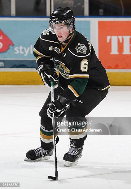 Scott Harrington of the London Knights skates with the puck in a game against the Erie Otters on January 22, 2010 at the John Labatt Centre in...