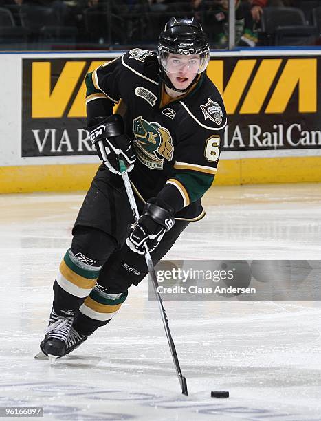 Scott Harrington of the London Knights skates with the puck in a game against the Erie Otters on January 22, 2010 at the John Labatt Centre in...