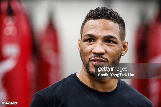 Kevin Lee looks on during an MMA masterclass at TripleFit gym on May 23, 2018 in Singapore.
