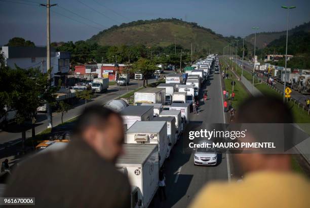 Brazilian truck drivers partially block Santos Dumont road , near the city of Mage, in Rio de Janeiro state, Brazil during a strike to protest...