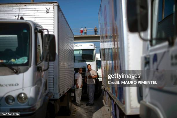 Brazilian truck drivers partially block Santos Dumont road , near the city of Mage, in Rio de Janeiro state, Brazil during a strike to protest...