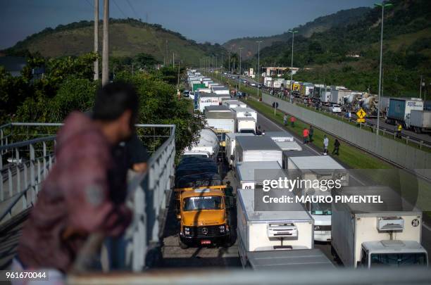 Brazilian truck drivers partially block Santos Dumont road , near the city of Mage, in Rio de Janeiro state, Brazil during a strike to protest...