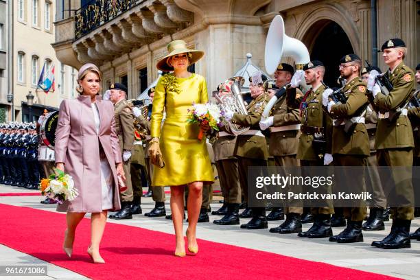 Queen Maxima of The Netherlands is welcomed by Grand Duchess Maria Teresa of Luxembourg with an official welcome ceremony on May 23, 2018 in...