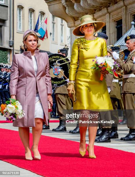 Queen Maxima of The Netherlands is welcomed by Grand Duchess Maria Teresa of Luxembourg with an official welcome ceremony on May 23, 2018 in...