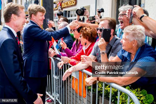 King Willem-Alexander of The Netherlands is welcomed by Grand Duke Henri of Luxembourg with an official welcome ceremony on May 23, 2018 in...
