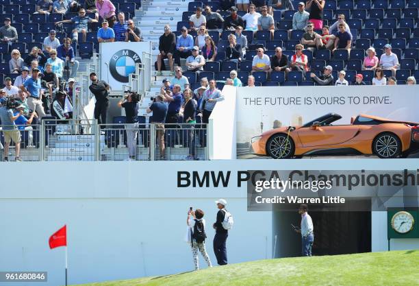 Alexander Levy of France and Rafa Cabrera Bello of Spain take part in a stunt as they play from the grandstand during the BMW PGA Championship Pro Am...