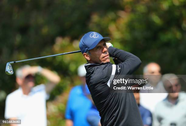 Ex-footballer Gianfranco Zola plays a shot during the BMW PGA Championship Pro Am tournament at Wentworth on May 23, 2018 in Virginia Water, England.