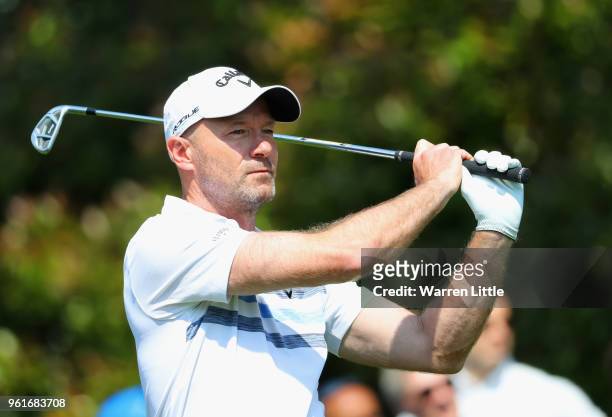 Ex-footballer Alan Shearer plays a shot during the BMW PGA Championship Pro Am tournament at Wentworth on May 23, 2018 in Virginia Water, England.
