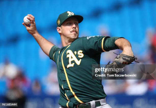Daniel Mengden of the Oakland Athletics delivers a pitch in the seventh inning during MLB game action against the Toronto Blue Jays at Rogers Centre...