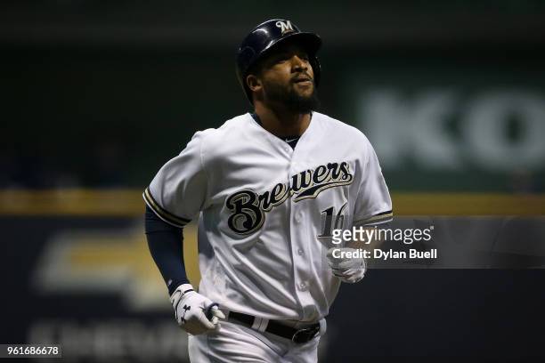 Domingo Santana of the Milwaukee Brewers rounds the bases after hitting a home run in the fourth inning against the Arizona Diamondbacks at the...