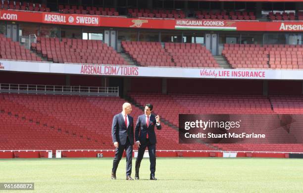 New Arsenal Head Coach Unai Emery with CEO Ivan Gazidis on the pitch at Emirates Stadium on May 23, 2018 in London, England.