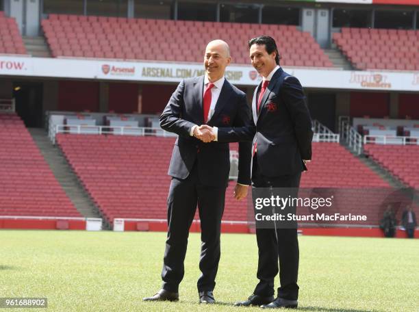 New Arsenal Head Coach Unai Emery with CEO Ivan Gazidis on the pitch at Emirates Stadium on May 23, 2018 in London, England.