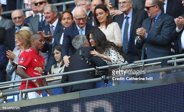 Jose Mourinho the head coach / manager of Manchester United shakes hands with Chelsea diretor Marina Granovskaia as chairman Bruce Buck looks on...