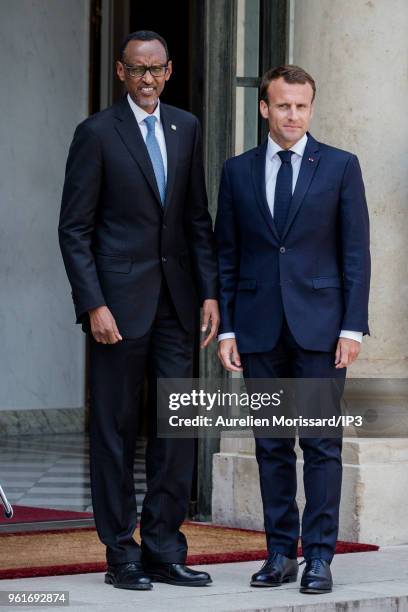 French President Emmanuel Macron welcomes the President of the Republic of Rwanda, Paul Kagame at Elysee Palace on May 23, 2018 in Paris, France....