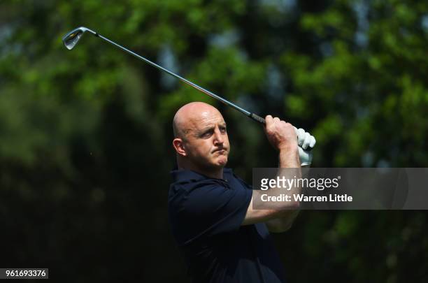 Ex-rugby player Keith Wood plays a shot during the BMW PGA Championship Pro Am tournament at Wentworth on May 23, 2018 in Virginia Water, England.