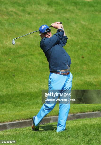 Broadcaster Chris Evans plays a shot during the BMW PGA Championship Pro Am tournament at Wentworth on May 23, 2018 in Virginia Water, England.