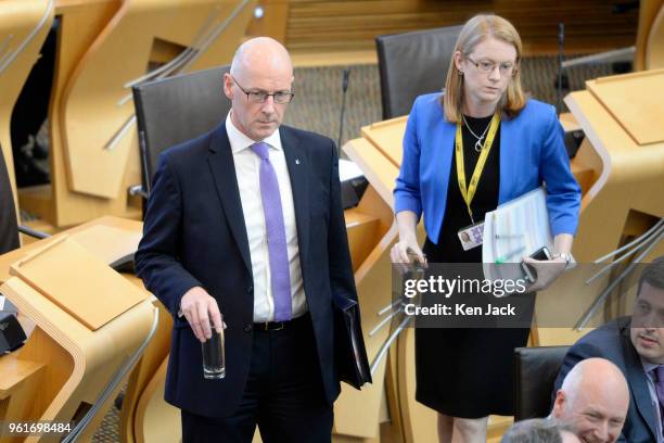 Scottish Education Secretary John Swinney and Higher Education Minister Shirley-Anne Somerville take their seats at the start of a Scottish...