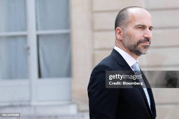 Dara Kowsrowshahi, chief executive officer of Uber Technologies Inc., walks in the courtyard of Elysee Palace during the Tech For Good meeting in...