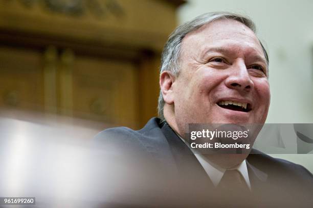Mike Pompeo, U.S. Secretary of state, smiles during a House Foreign Affairs Committee hearing in Washington, D.C., U.S., on Wednesday, May 23, 2018....