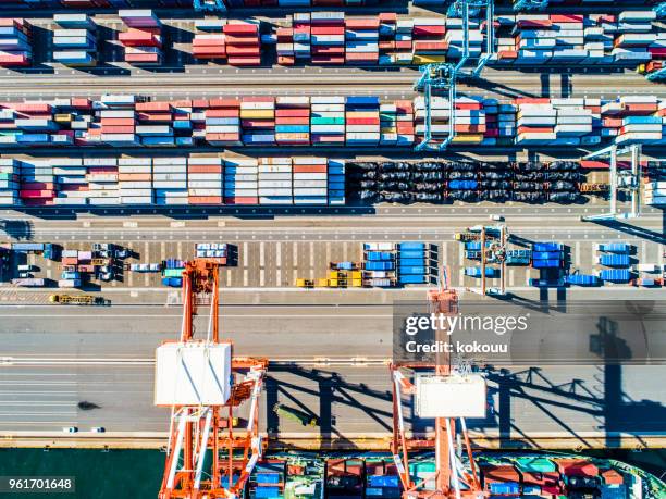 a place where lots of trade containers are lined up. - luggage hold stock pictures, royalty-free photos & images