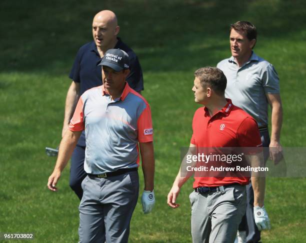 Ex-rugby player Keith Wood, Padraig Harrington of Ireland, ex-rugby player Brian O'Driscoll and ex-jockey Sir AP McCoy walk on the fairway during the...