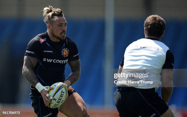 Jack Nowell of Exeter Chiefs attempts a pass during an Exeter Chiefs Media Session at Sandy Park on May 23, 2018 in Exeter, England.