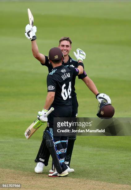 Will Jacks of Surrey celebrates his century with Dean Elgar of Surrey during the Royal London One-Day Cup match between Surrey and Gloucestershire at...