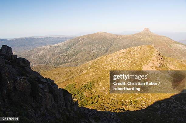 view of mount pelion east, 1433m, from mount ossa, 1617m, tasmania's  highest mountain on the overland track, cradle mountain lake st. clair national park, part of tasmanian wilderness, unesco world heritage site, tasmania, australia, pacific - overland track stock pictures, royalty-free photos & images