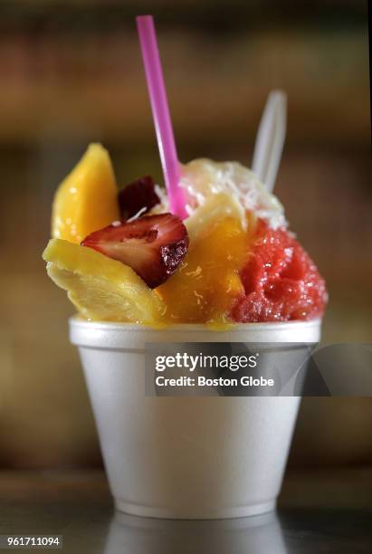 Raspadilla - shaved ice - made with mango, strawberry, and coconut is pictured at Frio Rico in East Boston on May 16, 2018.