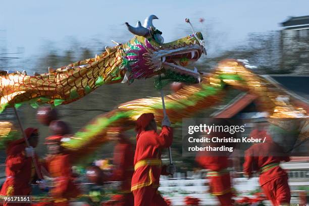 dragon dance, chinese new year, spring festival, beijing, china, asia - china culture stock-fotos und bilder