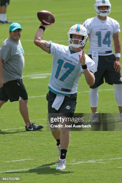 Ryan Tannehill of the Miami Dolphins throws the ball during the teams training camp on May 23, 2018 at the Miami Dolphins training facility in Davie,...