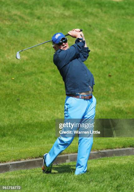 Broadcaster Chris Evans plays a shot during the BMW PGA Championship Pro Am tournament at Wentworth on May 23, 2018 in Virginia Water, England.