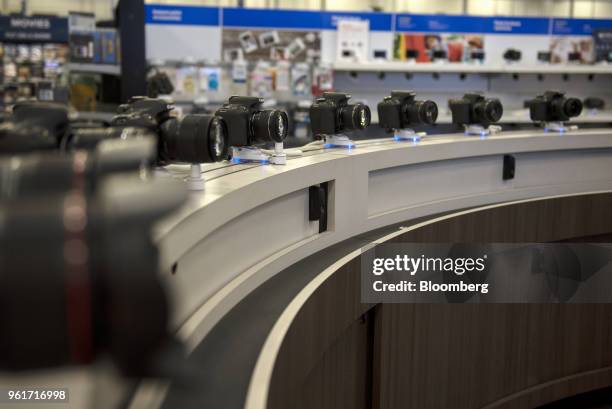 Canon Inc. DSLR cameras sit on display for sale at a Best Buy Co. Store in San Antonio, Texas, U.S., on Thursday, May 17, 2018. Best Buy Co. Is...