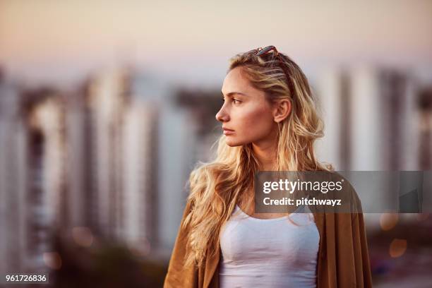portrait of woman at the roof party. - women in profile stock pictures, royalty-free photos & images