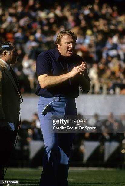 S: John Madden head coach of the Oakland Raiders watching the action from the sidelines during a mid circa 1970s NFL football game at the Oakland...