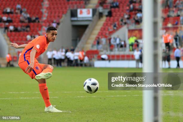 Mohammed Ihattaren of Netherlands scores his penalty in the shoot-out during the UEFA European Under-17 Championship Final match between Italy and...