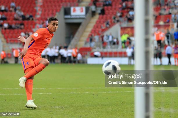 Mohammed Ihattaren of Netherlands scores his penalty in the shoot-out during the UEFA European Under-17 Championship Final match between Italy and...