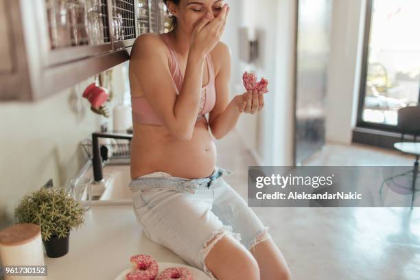 cravings in pregnancy - girly pregnant stock pictures, royalty-free photos & images