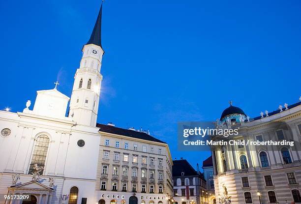 michaelerkirche spire in the evening, michaelerplatz, vienna, austria, europe - alte burg stock pictures, royalty-free photos & images