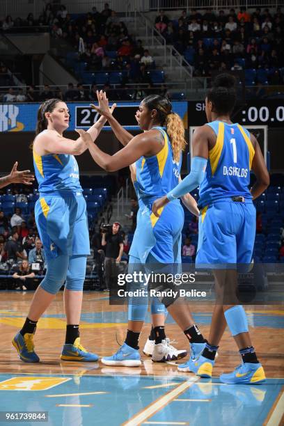 Stefanie Dolson and Cheyenne Parker of the Chicago Sky high five during the game against the Atlanta Dream on May 23, 2018 at the Wintrust Arena in...