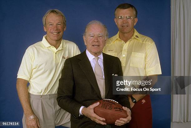 Head coach of the Washington Redskins Joe Gibbs owner Jack Kent Cooke and general manager Bobby Beathard pose together for this photo early circa...