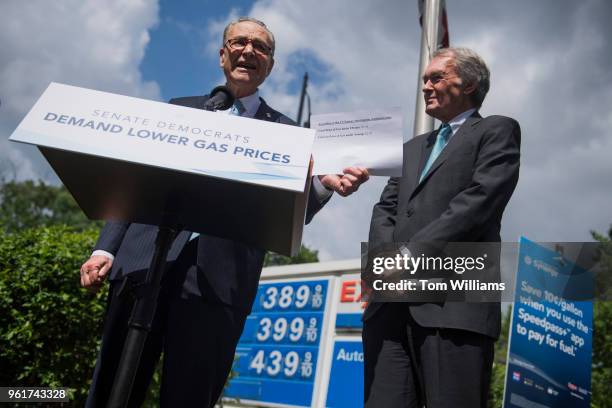 Senate Minority Leader Charles Schumer, D-N.Y., left, and Sen. Ed Markey, D-Mass., conduct a news conference at the Exxon gas station at...