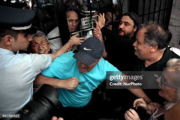 Demonstration against electronic property auctions in Athens, Greece on May 23, 2018. Protesters attempt to break into the notary office and prevent...